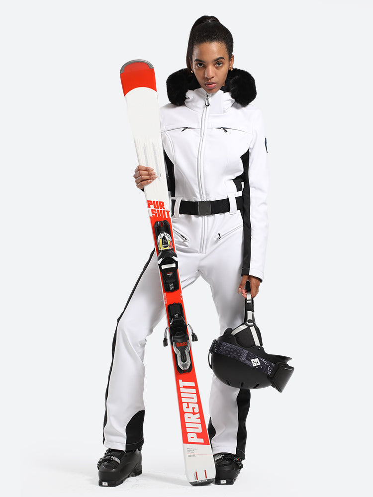Les Odettes women's classic faux fur one-piece ski suit, featuring a stylish design with faux fur accents for winter snowboarding.