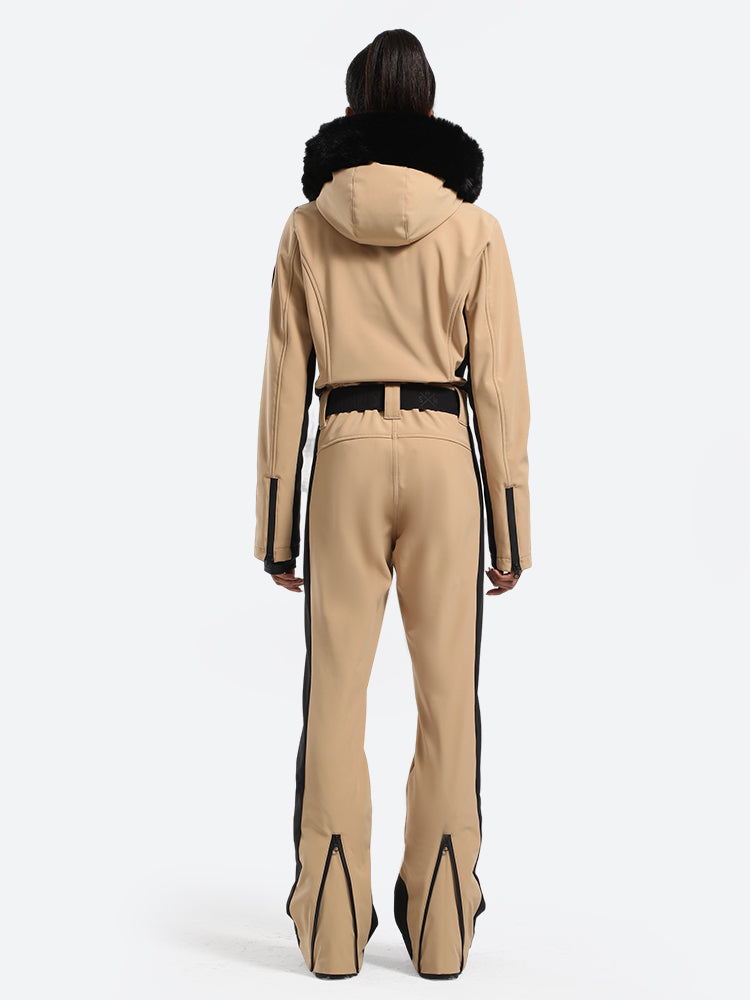 Les Odettes women's classic faux fur one-piece ski suit, winter ski gear with a stylish, insulated design for cold weather.