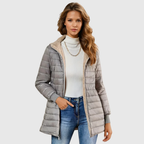 Les Odettes Geraldine™ Sherpa-lined winter coat with cozy fleece interior and stylish outer shell on a mannequin.