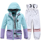 Men's Arctic King winter sport snowboard suit by Les Odettes, featuring a jacket and pants set designed for freestyle snowboarding.