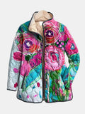 Les Odettes Holly™ floral patterned jacket with elegant design and vibrant floral print, shown in a stylish close-up view.
