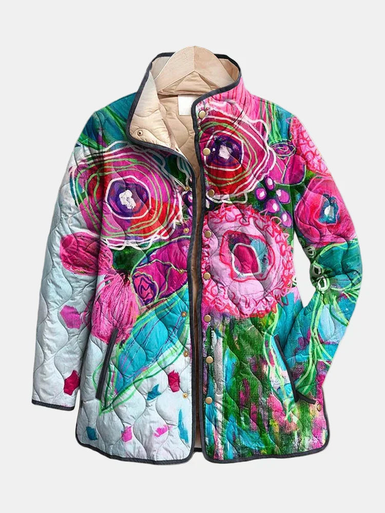 Les Odettes Holly™ floral patterned jacket with elegant design and vibrant floral print, shown in a stylish close-up view.