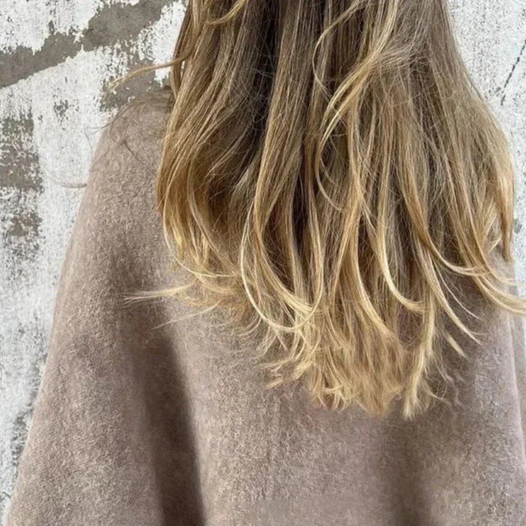 Veloura™ elegant coat by Les Odettes featuring a classic design, tailored fit, and sophisticated style in a high-quality fabric.