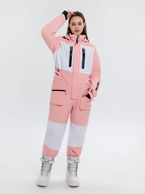 Les Odettes Women's Arctic Queen Slope Star Icon ski jumpsuit in winter snow, one-piece snow suit with star pattern and insulated design.