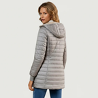 Les Odettes Geraldine Sherpa-lined winter coat with cozy fleece interior and stylish design, perfect for cold weather.