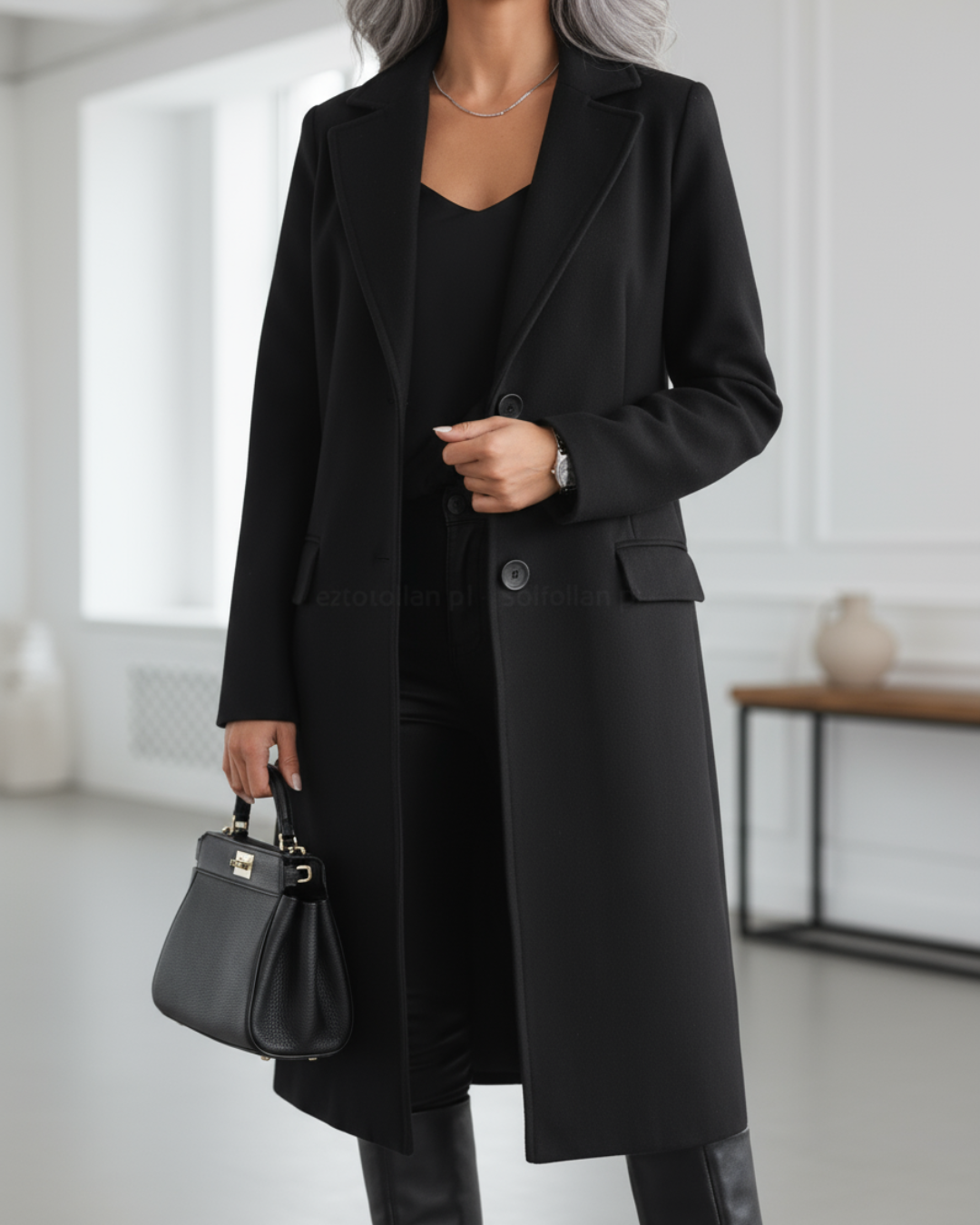 Judith™ elegant long coat by Les Odettes, shown in side view with tailored fit and classic collar on neutral background.
