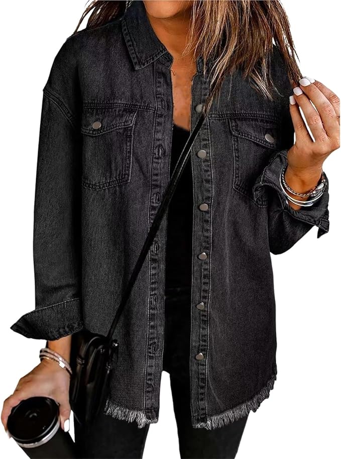 Les Odettes Gabriella™ denim jacket hanging on a wooden hanger, showcasing classic blue denim and stylish fit.