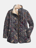 Les Odettes Georgia™ vintage floral quilted jacket with colorful floral print and quilted texture, stylish and cozy outerwear.