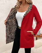 Les Odettes Aleah™ reversible coat with leopard print, showcasing the stylish, cozy outerwear with bold animal pattern and versatile design.