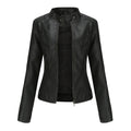 Black Zyra™ modern jacket by Les Odettes, featuring a sleek design and contemporary style, shown on a model.