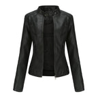 Black Zyra™ modern jacket by Les Odettes, featuring a sleek design and contemporary style, shown on a model.