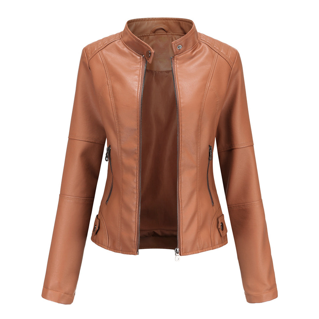 Les Odettes Zyra™ sleek modern camel jacket displayed on a hanger, showcasing its stylish design and contemporary silhouette.