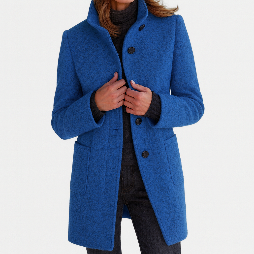 Les Odettes Camila™ women's coat in timeless style, featuring a classic silhouette with tailored details and neutral fabric.