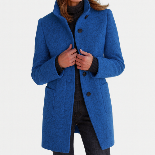 Les Odettes Camila™ women's coat in timeless style, featuring a classic silhouette with tailored details and neutral fabric.