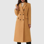 Les Odettes Ziva™ cozy overcoat in soft fabric, shown with a front view highlighting its stylish collar and warm, relaxed fit.