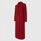 Les Odettes Sally™ longline winter trench coat displayed on a model, featuring a classic double-breasted design and belt.