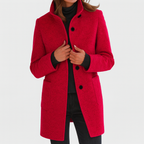 Les Odettes Camila™ timeless women's coat in classic design, shown on a model with neutral background and elegant styling.