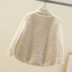 Faye wearing the Celeste™ soft comfort vest by Les Odettes, featuring a cozy, lightweight design in neutral tones.