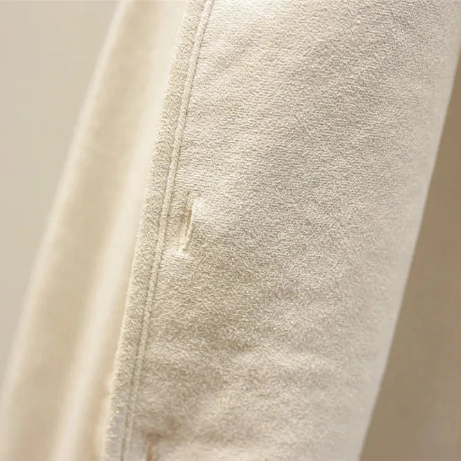 Les Odettes Celeste™ soft comfort vest displayed on a model, featuring a cozy, lightweight design in neutral tones.