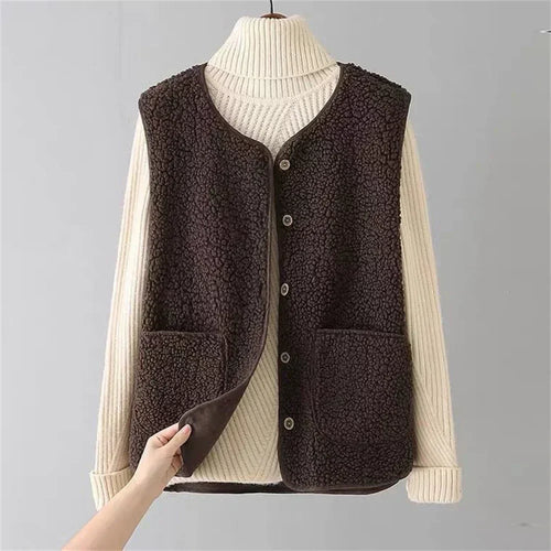 Les Odettes Celeste™ soft comfort vest displayed on a model, featuring a cozy, lightweight design in neutral tones.