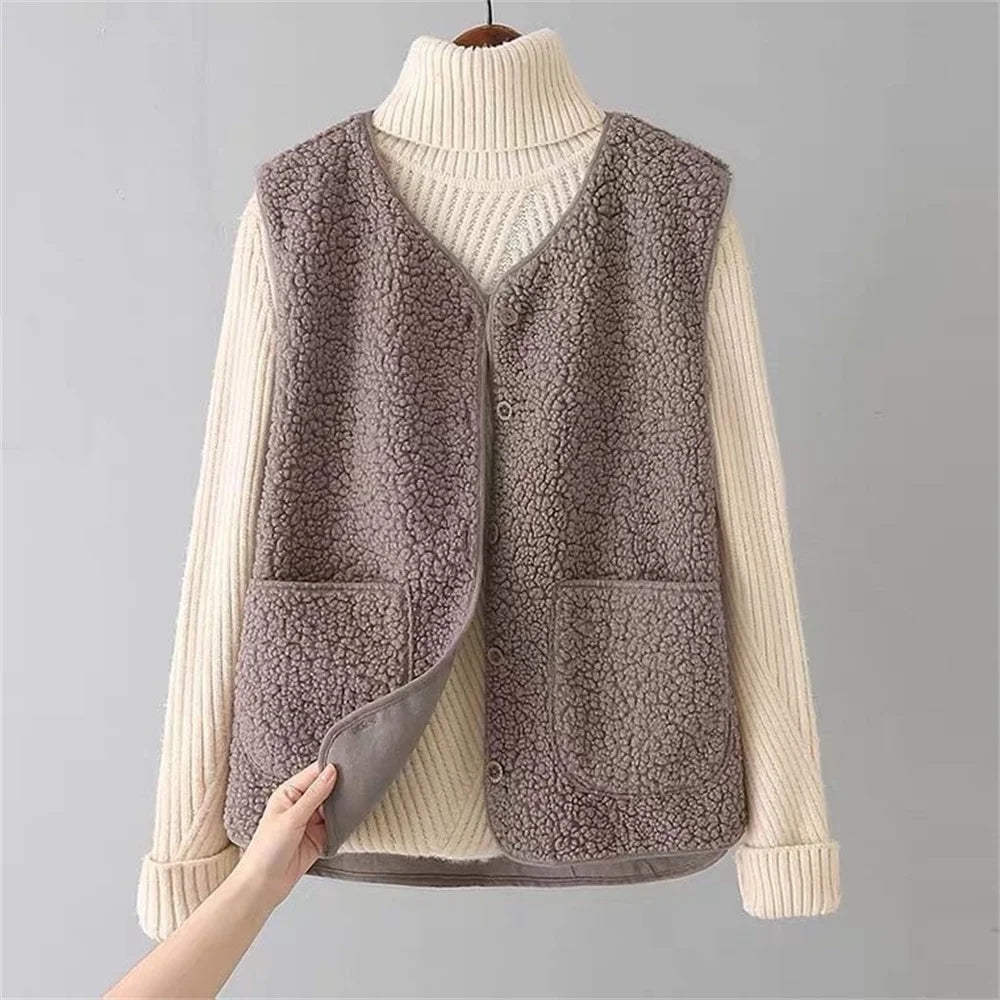 Les Odettes Celeste™ soft comfort vest in a cozy, lightweight design, shown in a close-up view highlighting its fabric texture.