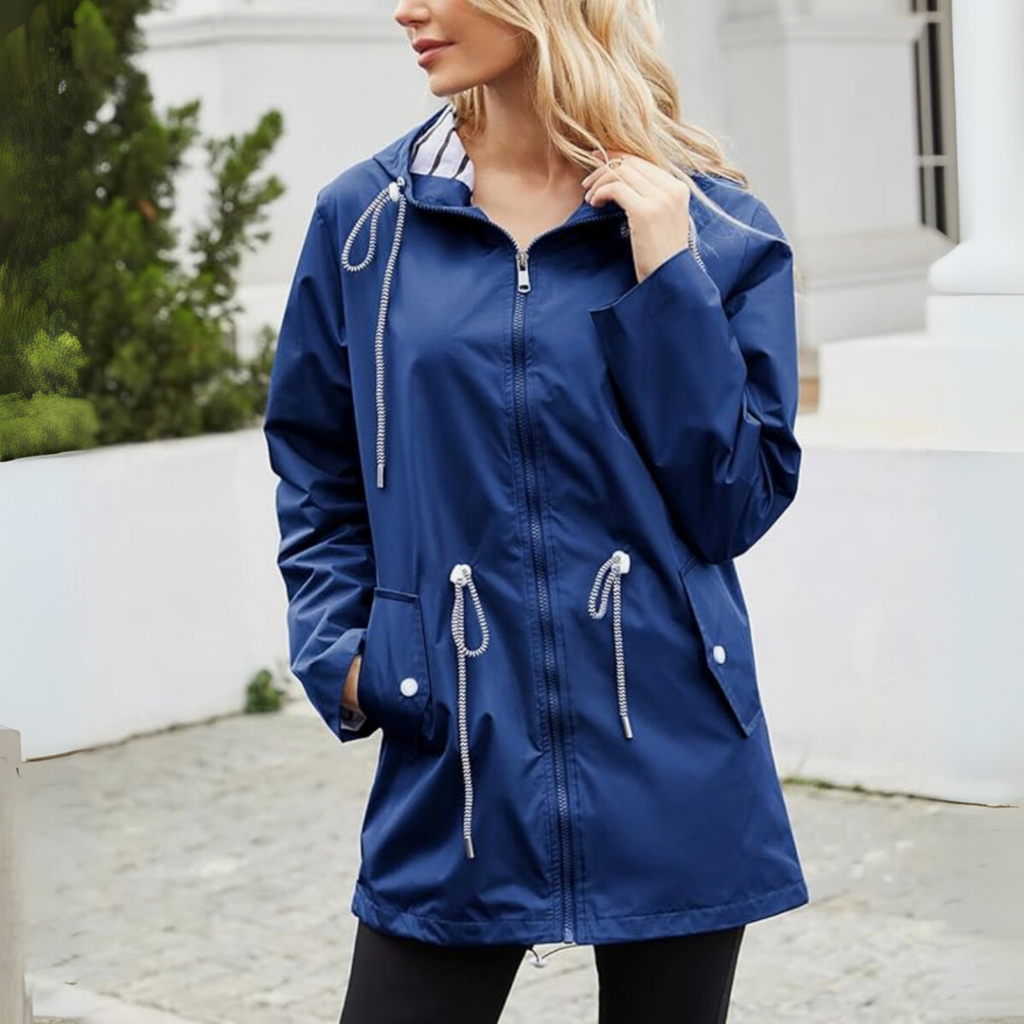 Les Odettes Noa™ waterproof jacket in sleek black, featuring a modern design and waterproof fabric, ideal for rain protection.