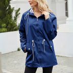 Les Odettes Noa™ waterproof jacket in sleek black, featuring a modern design and waterproof fabric, ideal for rain protection.