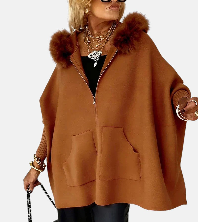Les Odettes Irene™ casual hooded coat worn by a person outdoors, featuring a relaxed fit and cozy hood for everyday wear.