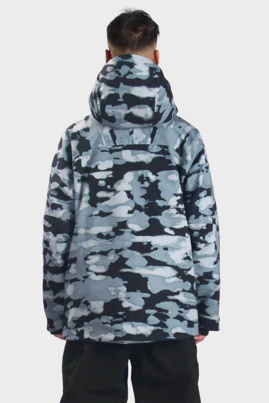 Men's camouflage snow jacket by Les Odettes with face vent, multiple pockets, and waterproof design for winter outdoor wear.