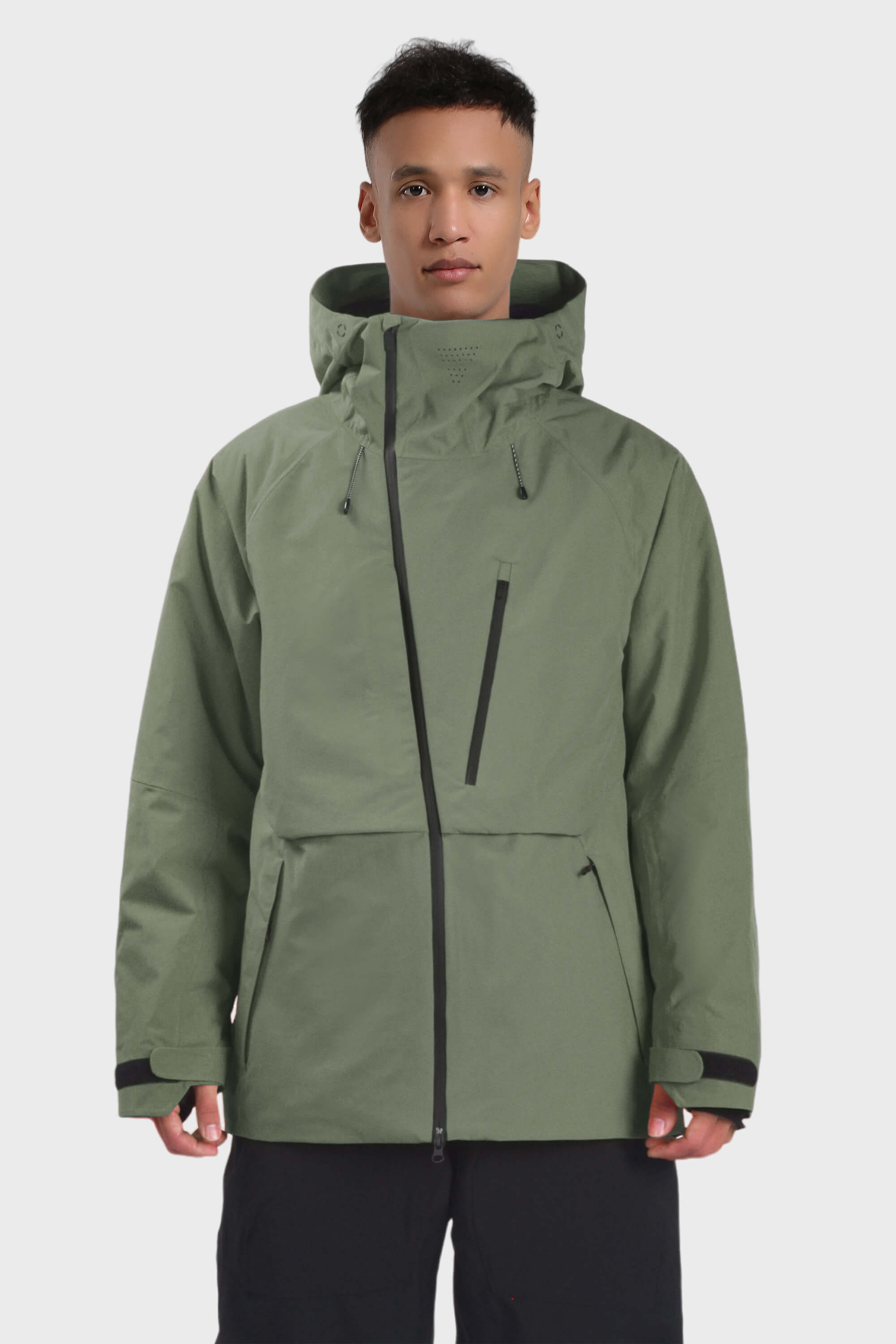 Men's camouflage snow jacket by Les Odettes, fully waterproof with face vent and multiple pockets for outdoor winter activities.
