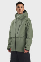 Men's camouflage snow jacket by Les Odettes with face vent, multiple pockets, and waterproof design, shown with a front view.