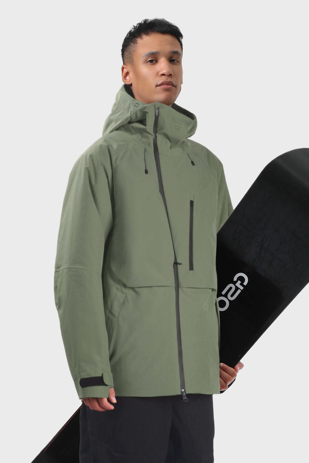 Men's camouflage snow jacket by Les Odettes with face vent, multiple pockets, and waterproof design for winter outdoor activities.