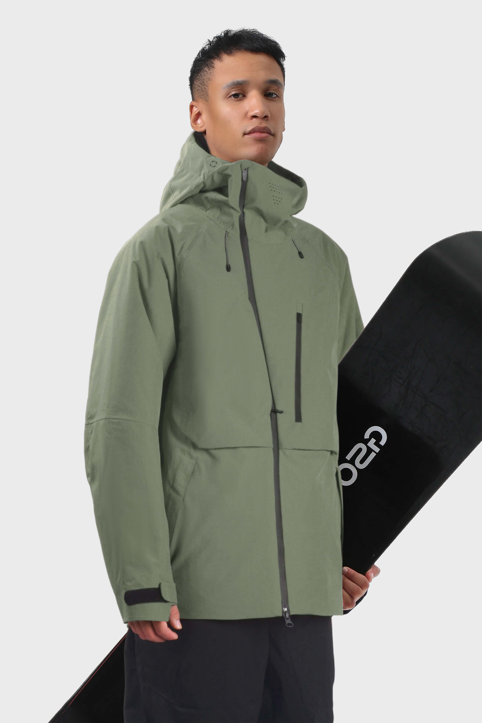 Men's camouflage snow jacket by Les Odettes with face vent, multiple pockets, and waterproof design for winter outdoor activities.