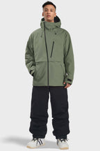 Men's camouflage snow jacket by Les Odettes, waterproof with face vent and multiple pockets, designed for winter outdoor activities.