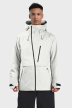 Men's camouflage snow jacket by Les Odettes with face vent, multiple pockets, and waterproof design, suitable for winter outdoor activities.