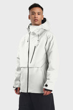 Men's camouflage snow jacket by Les Odettes with face vent, multi-pocket design, fully waterproof, suitable for winter outdoor activities.