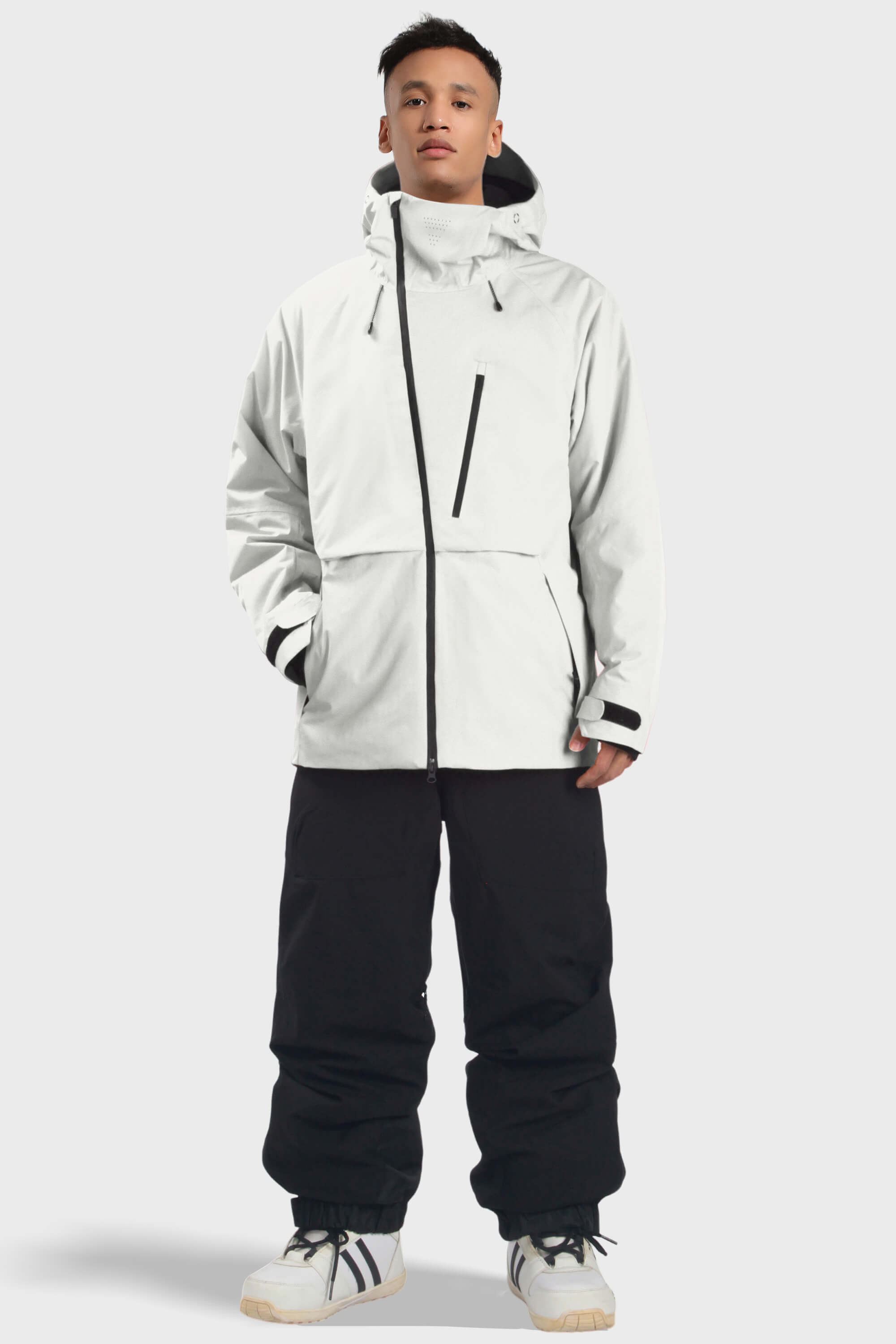 Men's camouflage waterproof snow jacket with face vent, multiple pockets, by Les Odettes, designed for winter outdoor activities.