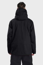 Men's camouflage snow jacket by Les Odettes featuring face vent, multiple pockets, and waterproof design in black.