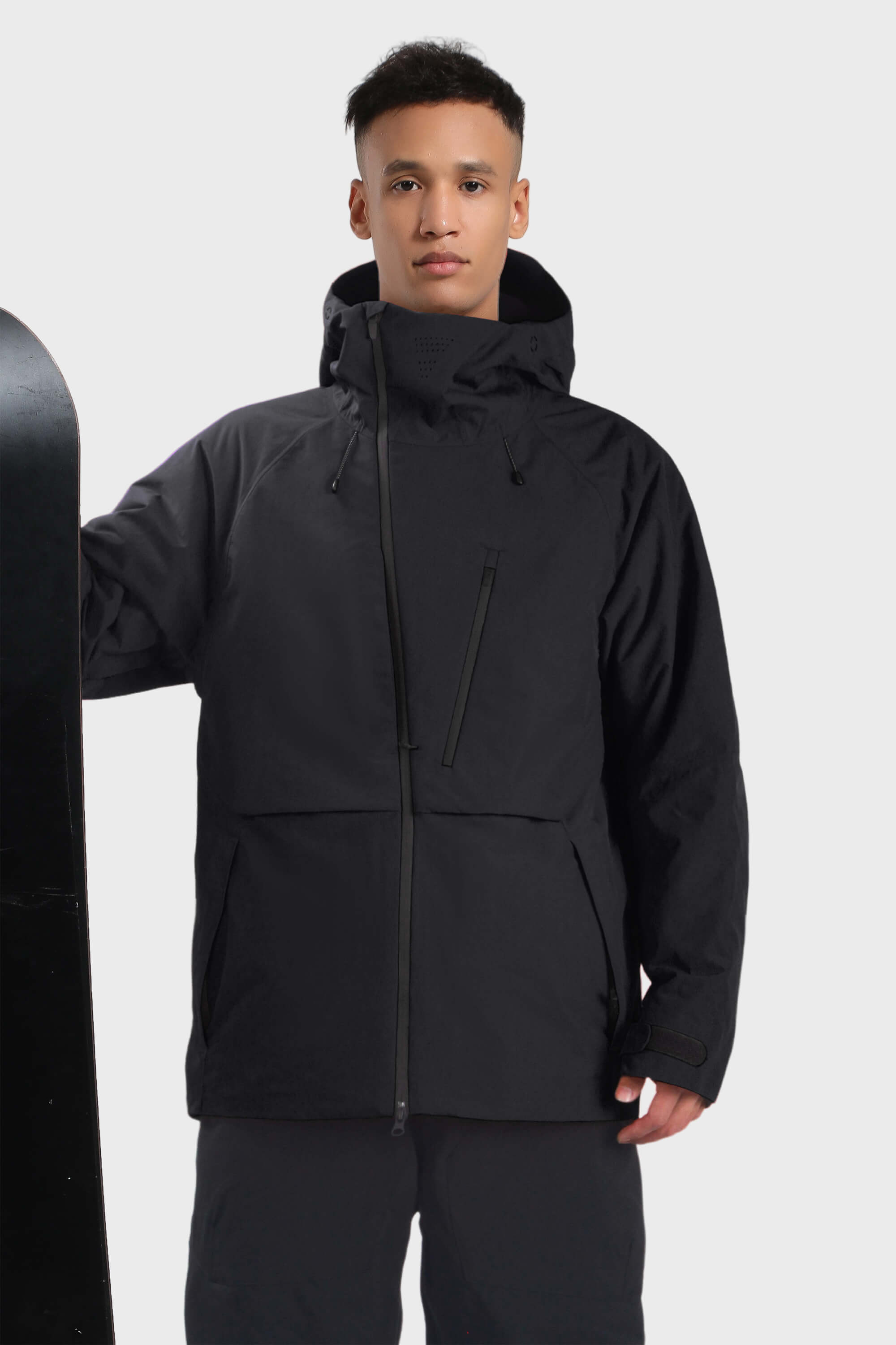 Men's camouflage snow jacket by Les Odettes with face vent, multiple pockets, and waterproof design, shown in black color.