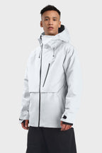 Men's camouflage snow jacket by Les Odettes with face vent, multi-pocket design, fully waterproof, ideal for winter outdoor activities.
