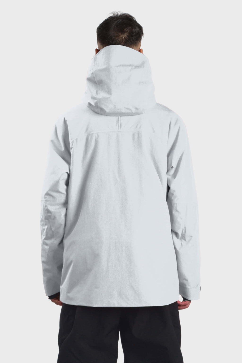 Men's camouflage snow jacket by Les Odettes, vented with multiple pockets, fully waterproof, in grey with a hood and zipper details.