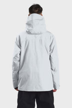 Men's camouflage snow jacket by Les Odettes, vented with multiple pockets, fully waterproof, in grey with a hood and zipper details.
