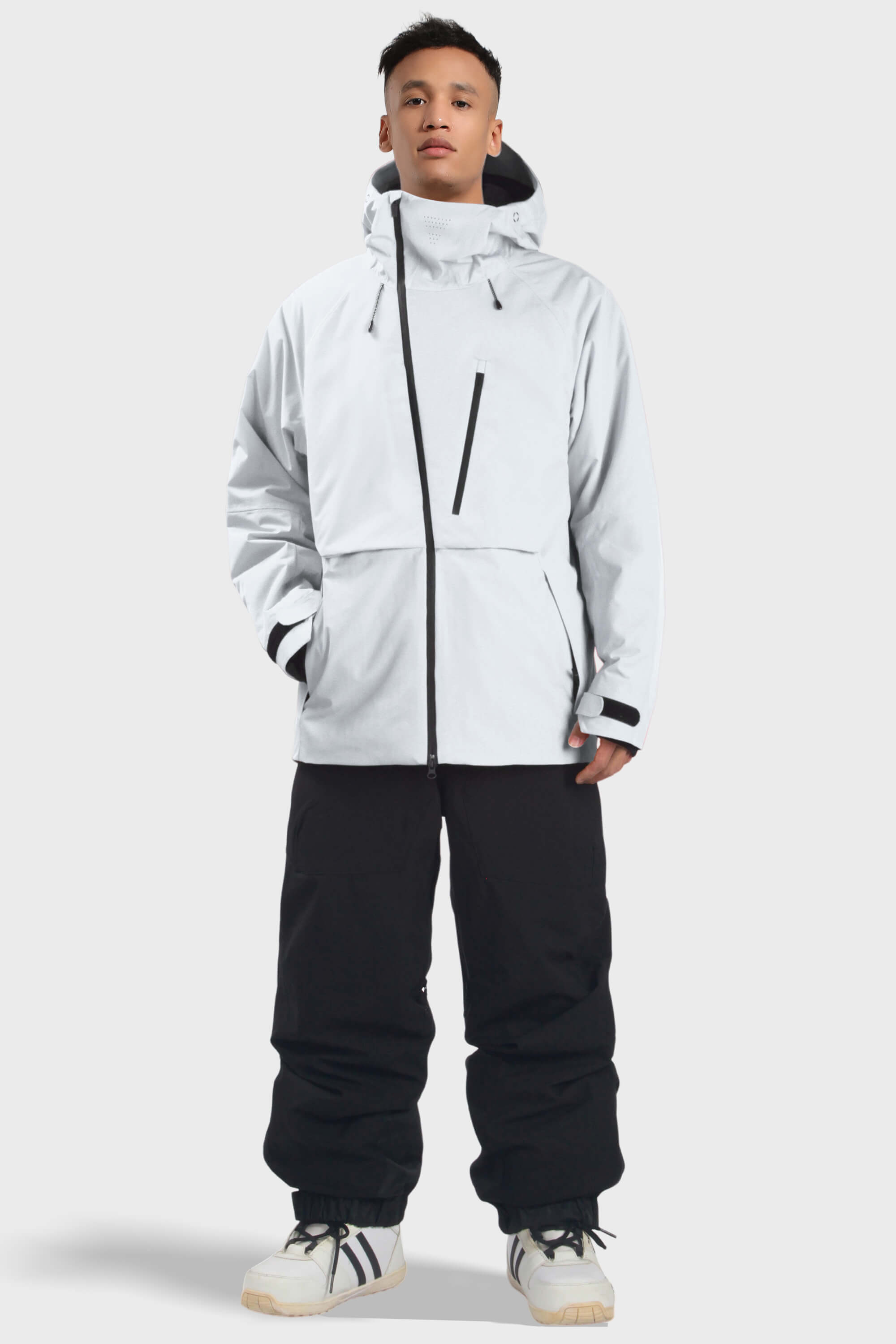 Men's camouflage snow jacket by Les Odettes with face vent, multiple pockets, fully waterproof, and insulated for winter outdoor activities.