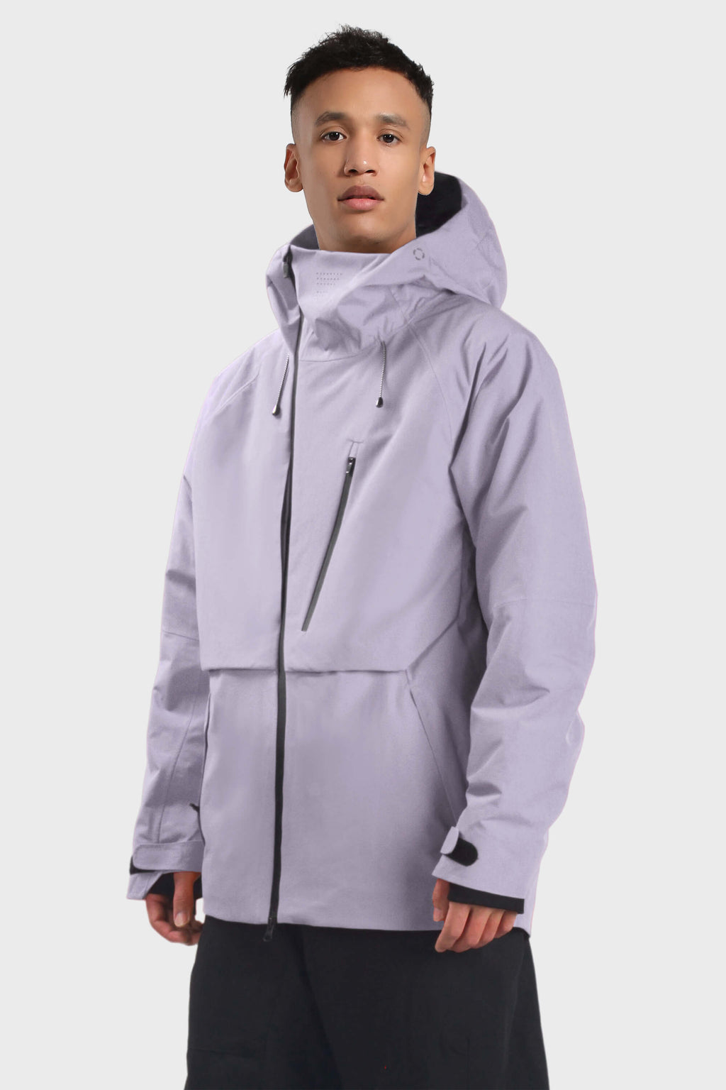 Men's camouflage snow jacket by Les Odettes with face vent, multiple pockets, fully waterproof, designed for cold weather outdoor activities.