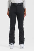 Black women's slim fit fleece-lined ski pants by Les Odettes, showing the snug fit and winter-friendly design.