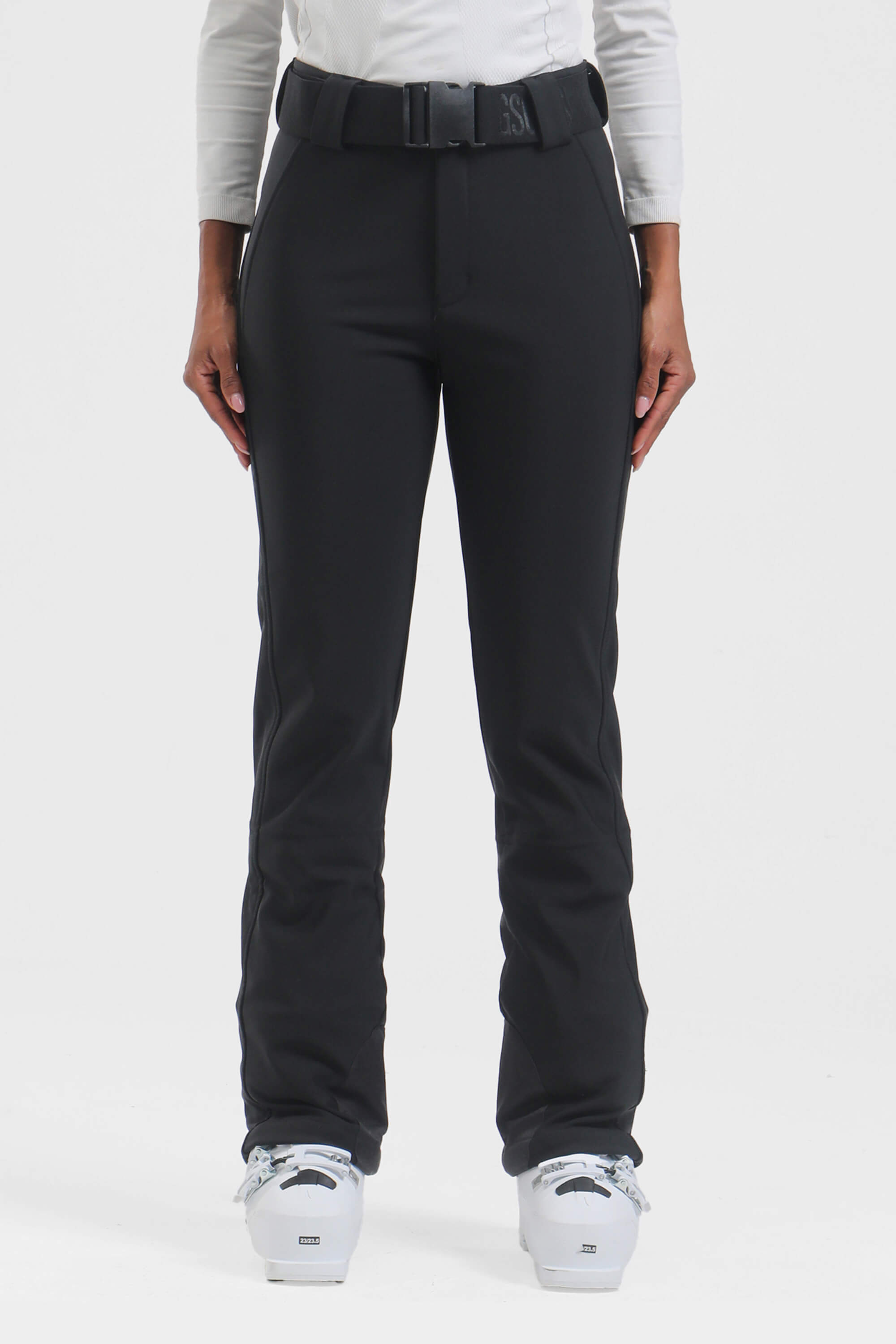 Black women's slim fit fleece-lined ski pants by Les Odettes, showing the snug fit and winter-friendly design.
