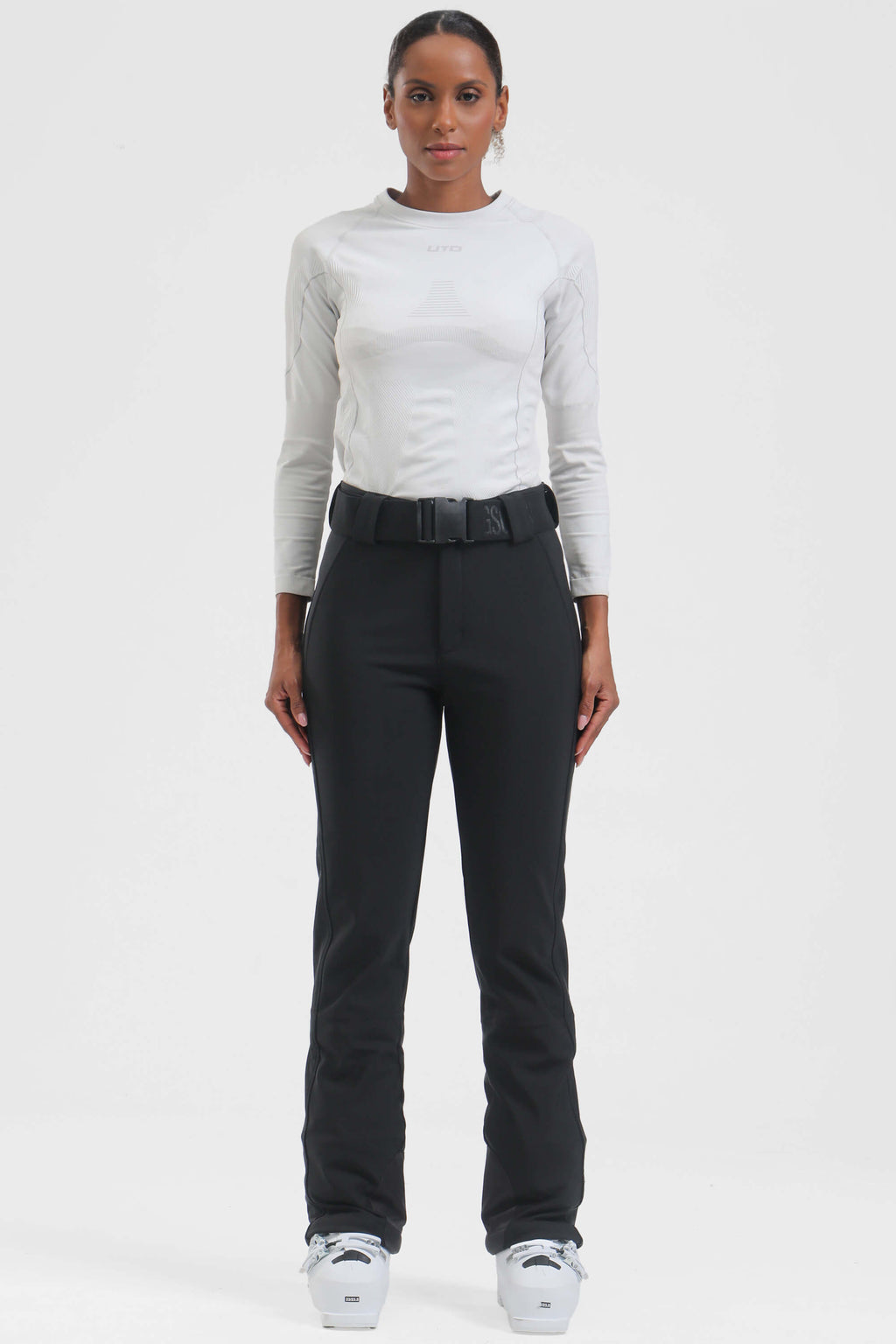 Black women's slim-fit ski pants by Les Odettes, fleece-lined and wearable for winter outdoor activities.
