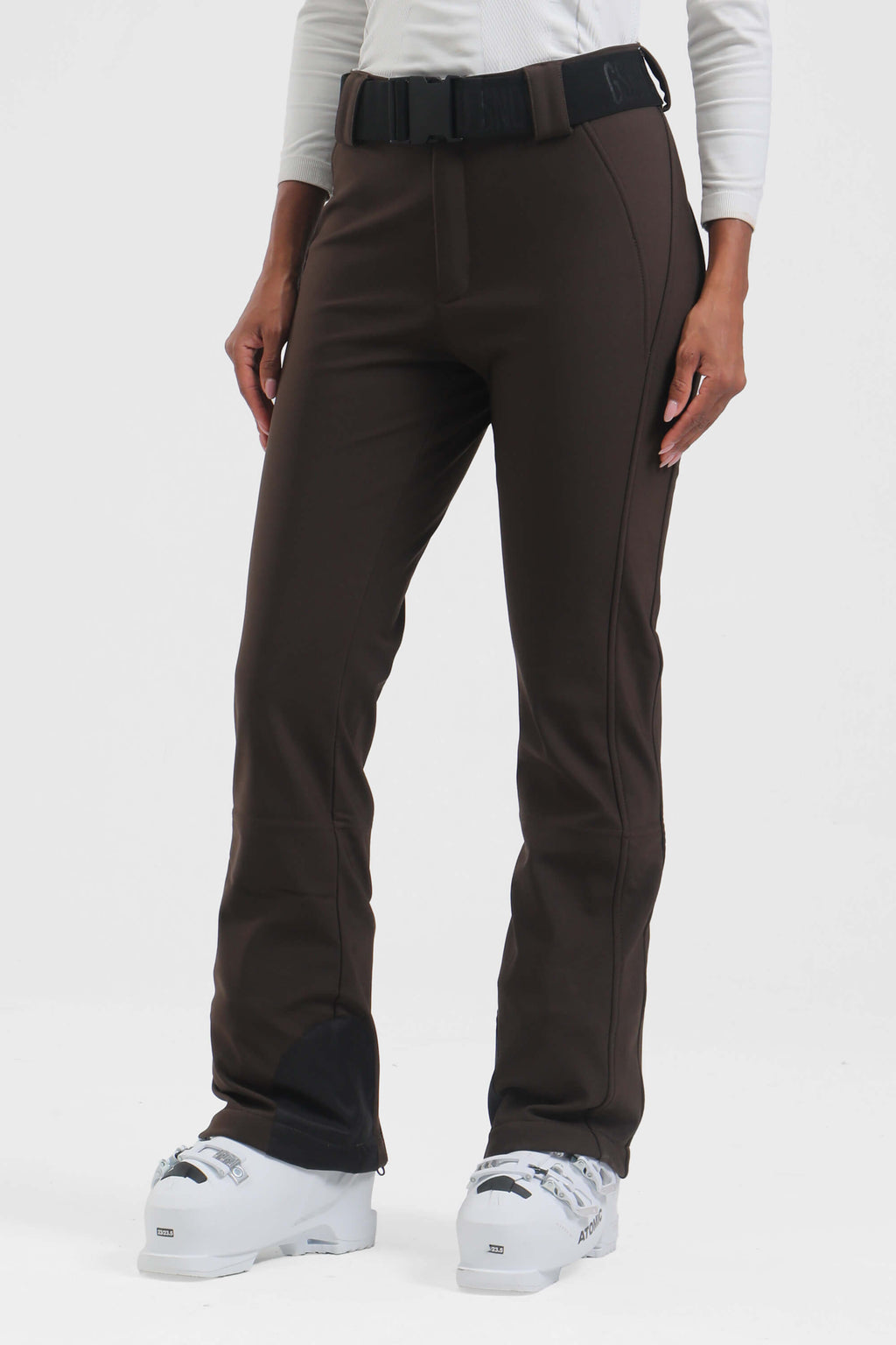 Women's black wearable slim fit fleece-lined ski pants by Les Odettes, showing the sleek, fitted design and fleece interior.
