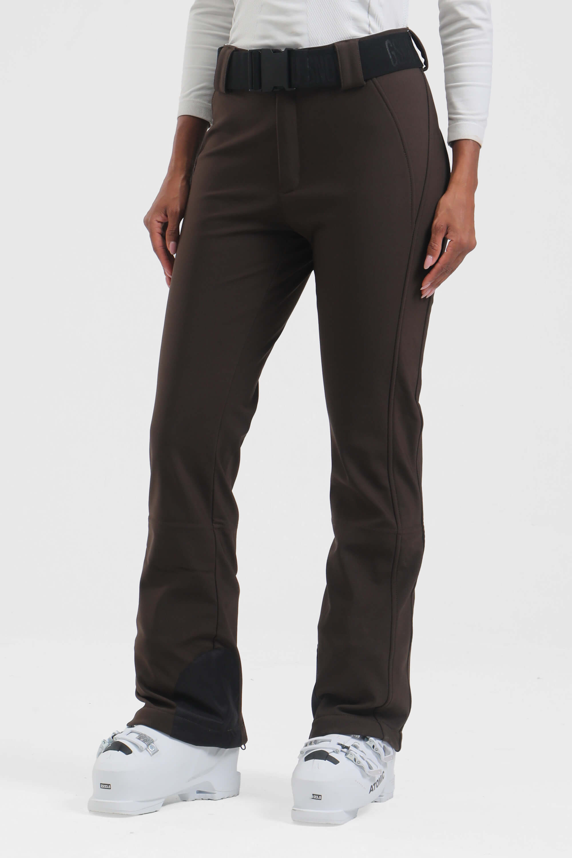 Women's black wearable slim fit fleece-lined ski pants by Les Odettes, showing the sleek, fitted design and fleece interior.