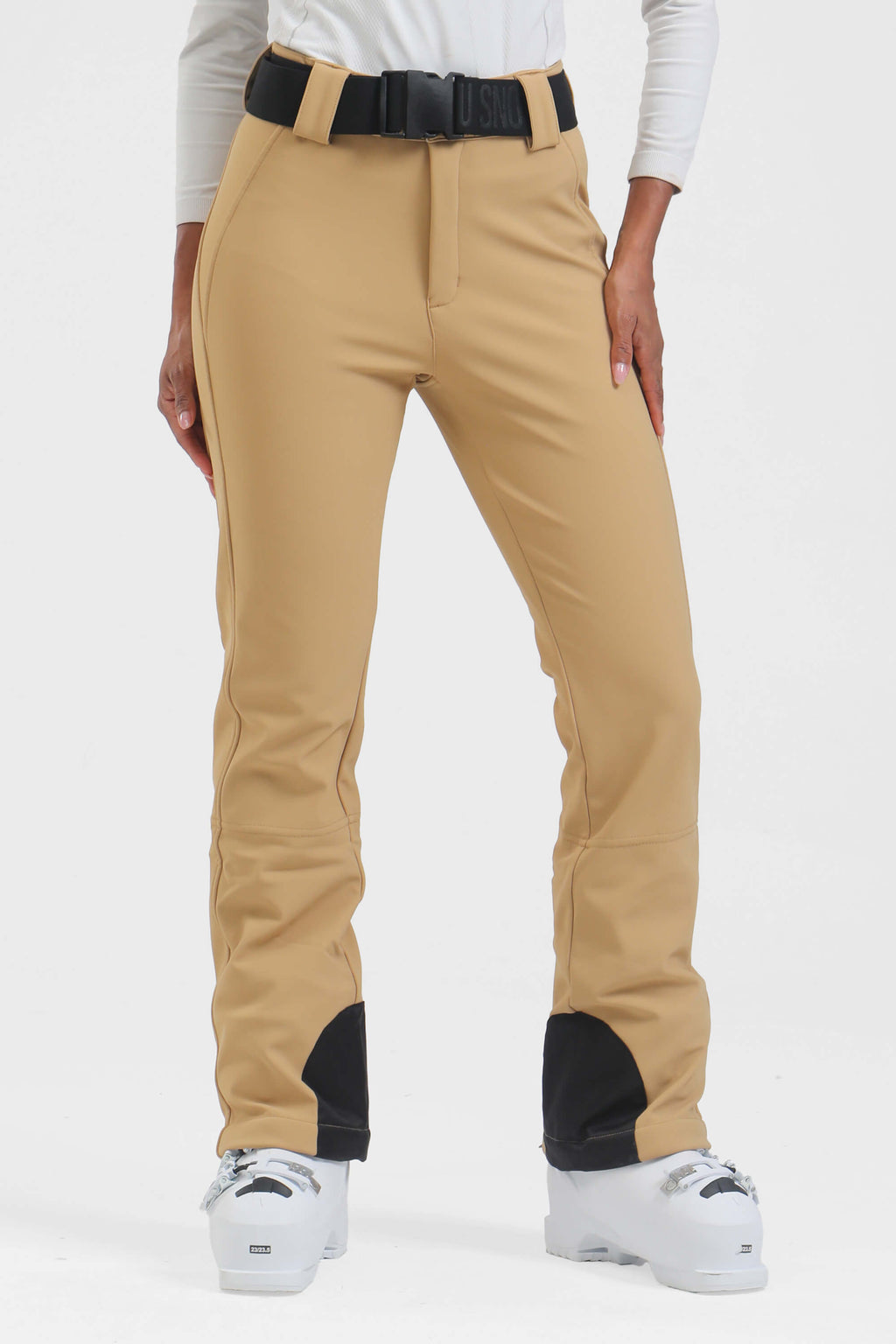 Black women's slim fit fleece-lined ski pants by Les Odettes, showing the fitted waist and winter-ready design.